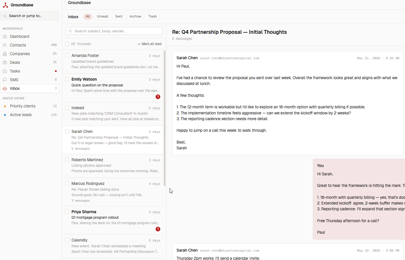 Inbox view with thread list and expanded conversation pane