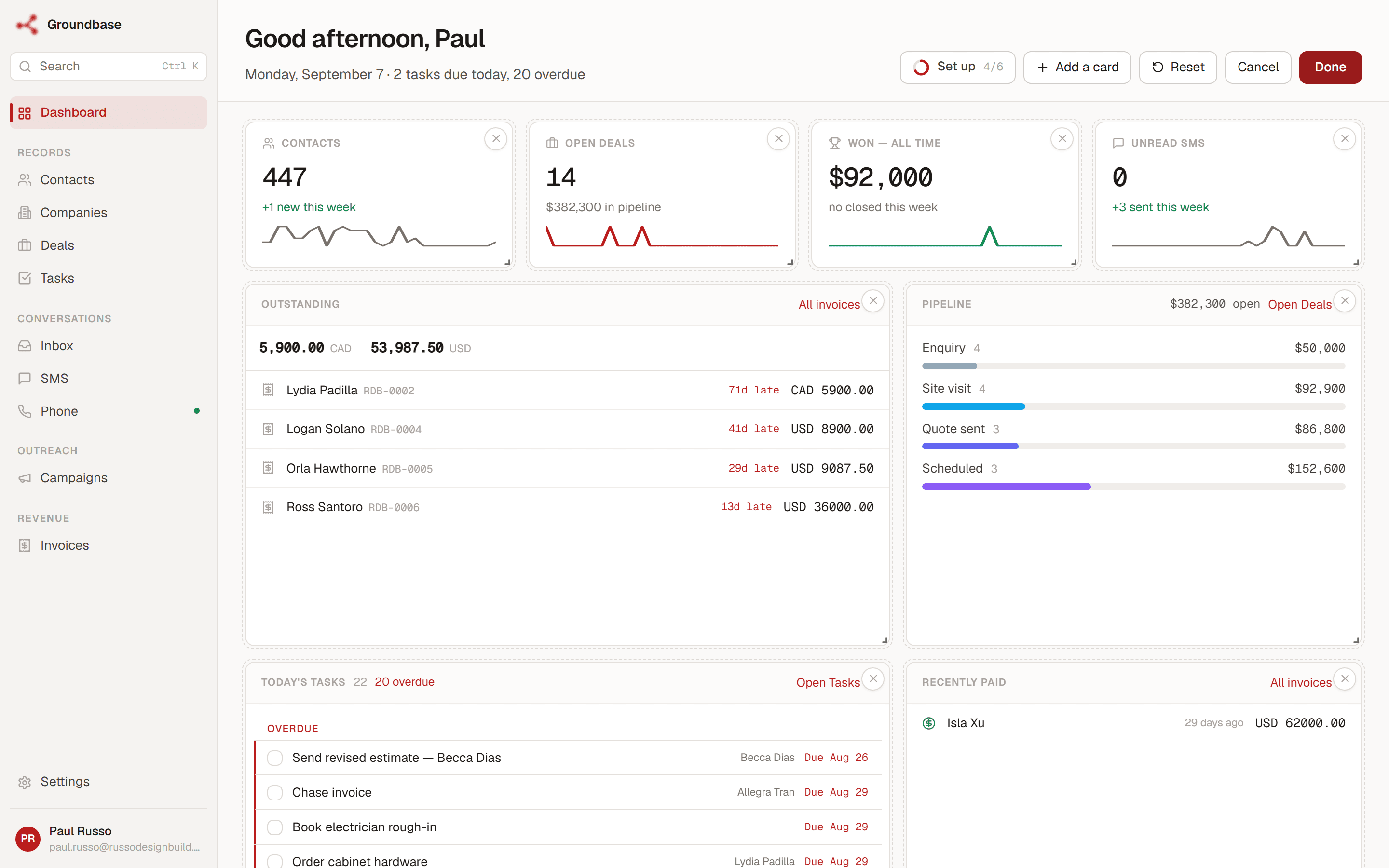 Dashboard in arrange mode — cards with drag handles, resize corners, and an add-a-card tray
